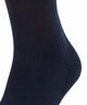 Close-up of FALKE unisex run sportsok in marine color, showcasing anatomical fit and comfort features.