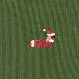 Burlington Brit Style Sokken Heren 21405 7656 fir green geborduurd teckelmotief op groene achtergrond.