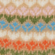 Kleurrijk fair isle patroon op Burlington damessok, met bloemen en strepen, gemaakt van katoen in zomerse kleuren.