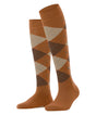 Burlington dames kniekousen in caramel met klassiek ruitpatroon, gemaakt van merinowol voor optimaal comfort.