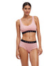 Model wearing FALKE 2-Pack Bustier Daily Comfort in pink, showcasing stylish and comfortable lingerie.