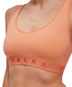 FALKE bustier in zacht oranje, comfortabel voor dagelijks gebruik, ideaal voor de moderne vrouw.