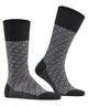 FALKE Airport Special Edition Heren 12424 3080 anthra.mel. Modern heren sokken met fantasiepatroon en merinowol.