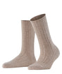 FALKE extra lange beige melange bootsokken met ribstructuur en subtiel glittereffect voor dames.