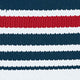 Close-up van de gestreepte stof van de FALKE Hardloopsok Endurance RU4 Cool in wit, blauw en rood.