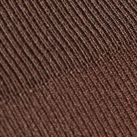 Detail van een bruine, ribbelige stoftextuur voor modeaccessoires.