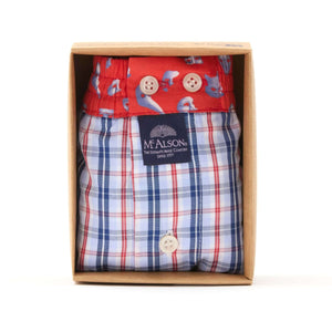 McAlson boxershort in lichtblauw-rood-wit ruitjesprint, verpakt in doos, met binnenbroek en logo.