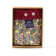 McAlson gele boxershort met paisleyprint in verpakking met donkerrode boord en knopen.