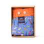 McAlson boxershort in blauwe peperprint met oranje boord, verpakt in een stijlvolle doos.