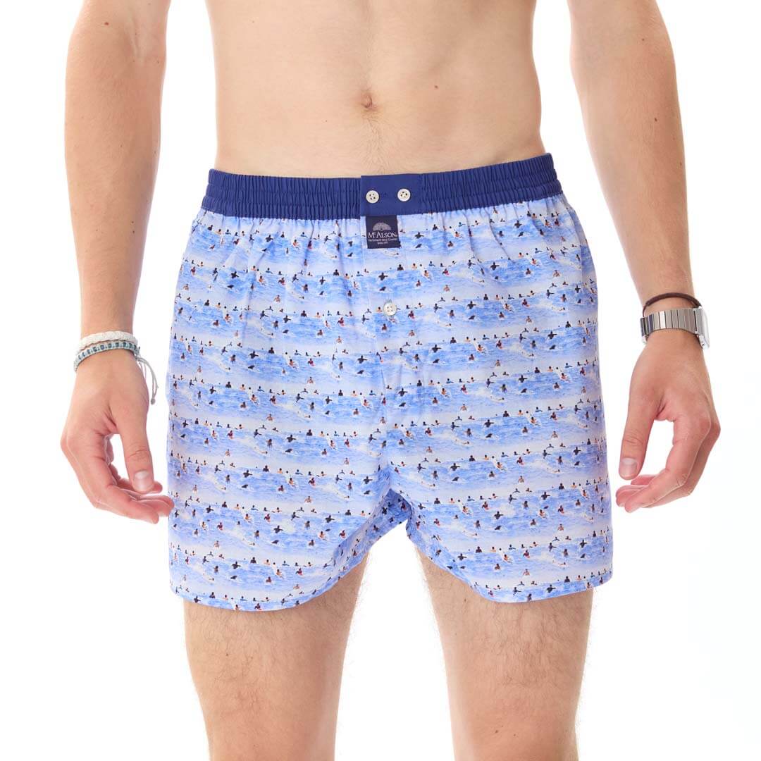 Blauwe boxershort met surfersprint en donkerblauwe boord, perfect voor stijl en comfort.