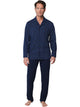 Pastunette Tweedelige Doorknoop Pyjama Heren 122199-510-2 520 Dark Blue gedragen door man met een grafisch design pyjamajasje.