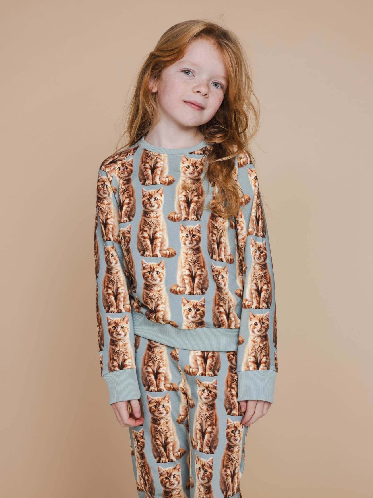 SNURK Bowie Sweater Kids met schattige kattenprint, comfortabel en stijlvol voor kinderen.