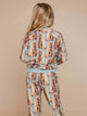 SNURK Bowie Sweater Kids met schattige kattenprint op een meisje in relaxed-fit sweaterstijl.
