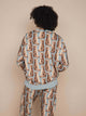 SNURK Bowie Sweater Unisex met kattenprint, relaxte fit en raglanmouwen, ideaal voor comfortabel thuisblijven.
