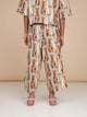Kind met SNURK Bowie Wijde broek Kids en matching top met kattenprint, in relaxte fit en zacht katoen.