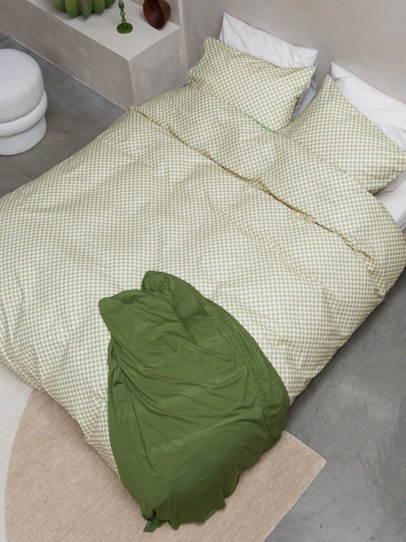 SNURK Check Green Beige dekbedovertrek in groen en beige geruit design, gemaakt van 100% biologisch katoen.
