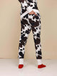 SNURK Cow Broek Unisex: unisex joggingbroek met koeienhuidprint, perfect voor comfort thuis.