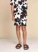 SNURK Cow Shorts Kids, katoen short met koeienhuidprint voor kinderen, relaxed fit en GOTS gecertificeerd.