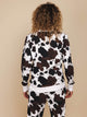 SNURK Cow Sweater Dames in stoere koeienhuidprint, comfortabel en trendy, ontworpen in Amsterdam.