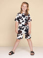SNURK Cow T-shirt Kids met koeienprint, perfect voor kinderen in een relaxte stijl.