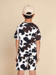 SNURK Cow T-shirt Kids achterzijde met koeienprint, perfect voor kinderen en gemaakt van biologisch katoen.
