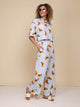 SNURK Croissants Cropped T-Shirt Dames met croissantjes print, draagt comfortabel en leuk voor relax- of slaapoutfit.