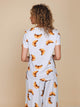 SNURK Croissants V-Neck T-shirt Dames met vrolijke croissantprint aan de achterkant.