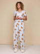 SNURK Croissants Wijde Broek Dames met versgebakken croissantjes op comfortabele broek en T-shirt