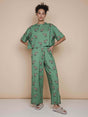 SNURK Donkeys Wijde broek Dames in zachtgroene kleur met schattige baby-ezels print.
