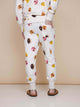 SNURK Donuts Broek Regular Unisex met kleurrijke donutprint op een zachte achtergrond.