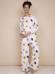 SNURK Donuts Long Sleeve T-shirt Dames met kleurrijke donuts op een zachte achtergrond, perfect voor een relaxte dag.