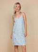 SNURK Hopeless Romantic Strap Dress Dames met bloemenprint, luchtig en perfect voor warme zomernachten.