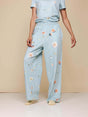 SNURK Hopeless Romantic Wijde Broek Dames met bloemenprint en wijde pijpen in zacht biologisch katoen.