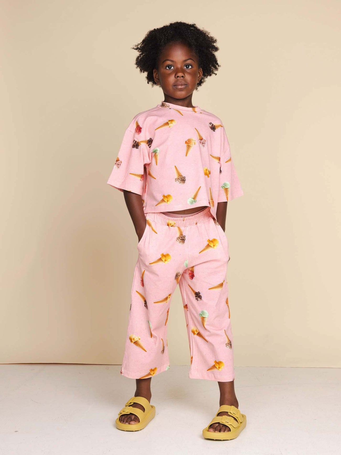 SNURK Ice Cream Cones Wide Pants Kids in stylish pink with ice cream prints, perfect for summer play.
