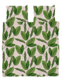 SNURK Leaf Me dekbedovertrek met groene bladerenprint voor een tropische uitstraling.