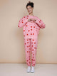 SNURK Lollipop Love Broek Relaxed Unisex met hartjeslollies op roze, perfect voor casual comfort.