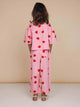 SNURK Lollipop Love Cropped T-Shirt Kids in pink with heart lollipops, perfect for playful and cozy days.