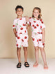 SNURK Mon Cherry T-shirt Kids in zachte biologische katoen met vrolijke kersjes, perfect voor kinderen.