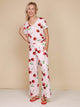 SNURK Mon Cherry V-Neck T-shirt Dames met kersenprint op de relaxte outfit, perfect voor thuis of slaap.