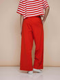 SNURK Red Wijde broek Kids, achteraanzicht met wijde pijpen en comfortabele pasvorm.