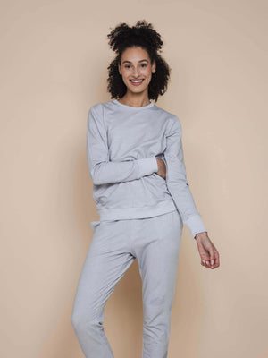 SNURK Slow Grey Sweater Dames, zachte grijze sweater voor dames met comfortabele pasvorm en elastische boordjes.